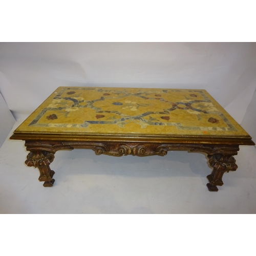 73 - A good continental lounge table having a fine inlaid rectangular shaped marble top on carved decorat... 