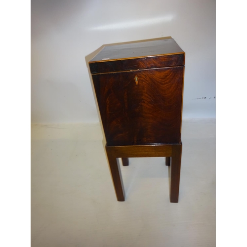 76 - Neat size antique mahogany decanter box on stand. H. 57cm.