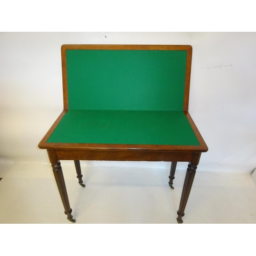 77 - Good 19th century mahogany fold over card table raised on fluted legs. W. 92cm, D. 46cm, H. 78cm app... 