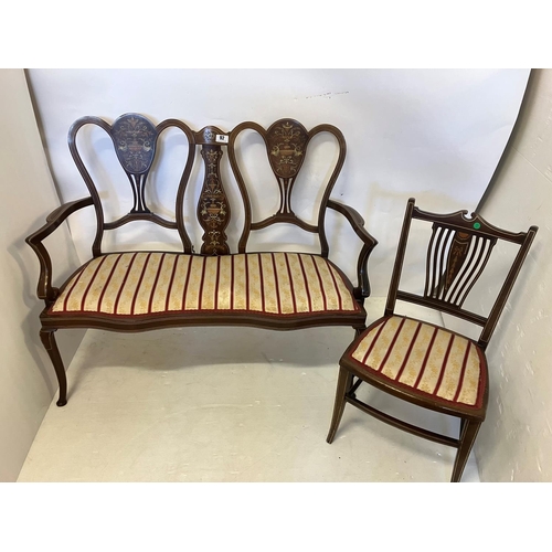 92 - Edwardian inlaid mahogany two seater settee having nicely shaped back, open arms and raised on cabri... 