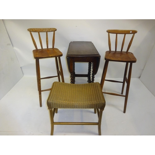 94 - Oak drop leaf table, pair of kitchen stools and a Lloyd Loom stool. (4)