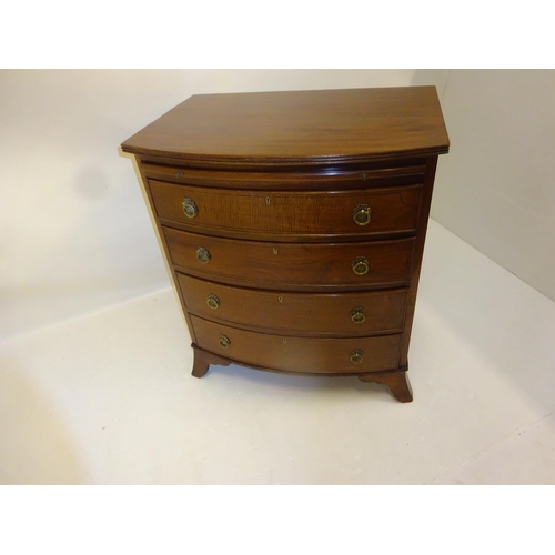 96 - Good antique mahogany bow shaped chest having brush slide and 4 graduated drawers raised on splay fe... 