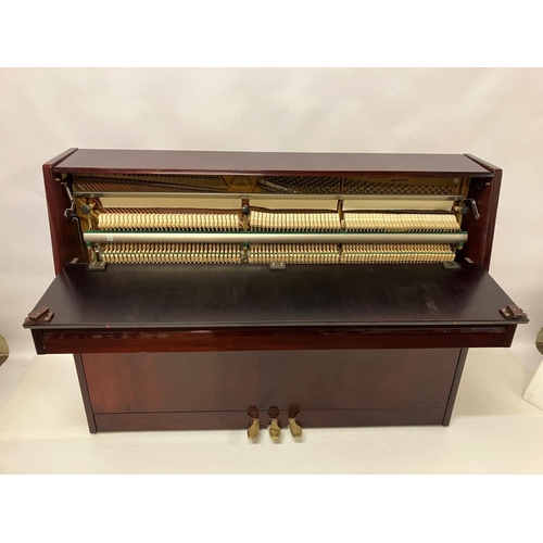 100 - Kohler & Campbell - A very good upright overstrung piano. W. 146cm, H. 109cm, D. 56cm approx.