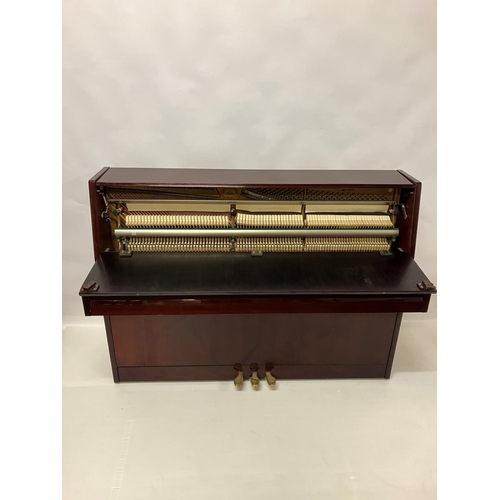 100 - Kohler & Campbell - A very good upright overstrung piano. W. 146cm, H. 109cm, D. 56cm approx.