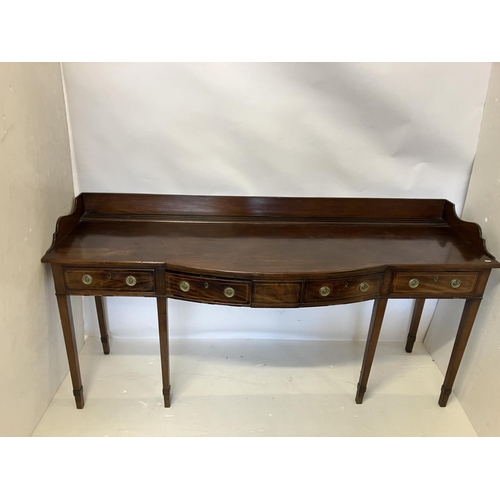 115 - A good Georgian mahogany side table, the shaped tray back top fitted with 4 drawers and raised on ta... 