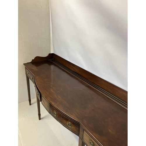 115 - A good Georgian mahogany side table, the shaped tray back top fitted with 4 drawers and raised on ta... 