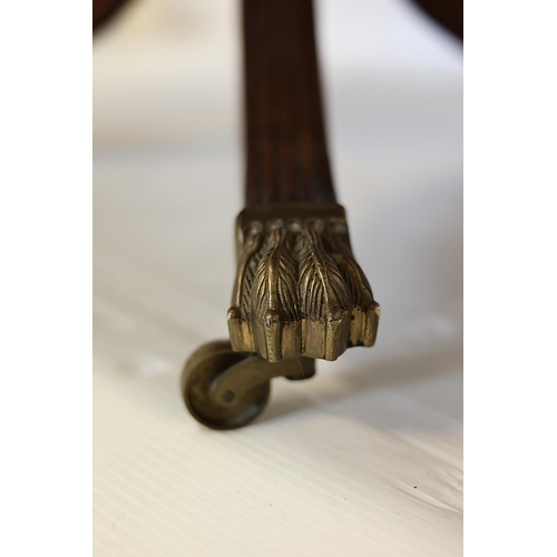 119 - A good Cork Regency mahogany breakfast table, the reeded top raised on turned centre column with fou... 