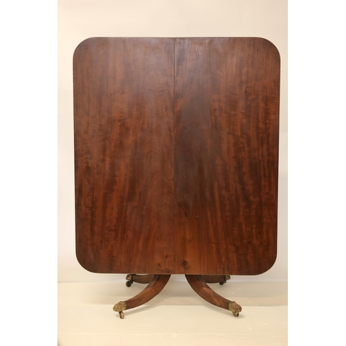 119 - A good Cork Regency mahogany breakfast table, the reeded top raised on turned centre column with fou... 