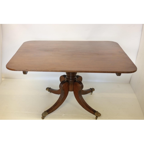 119 - A good Cork Regency mahogany breakfast table, the reeded top raised on turned centre column with fou... 