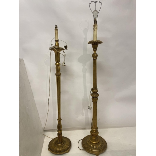 123 - Two tall gilt wood standard lamps. AF.