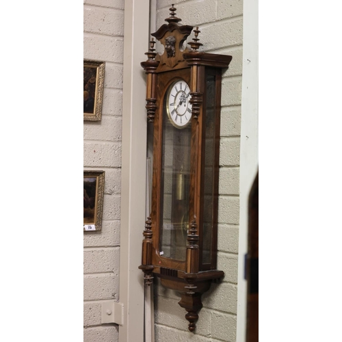 133 - Antique walnut cased Vienna wall clock with brass weights. L. 135cm