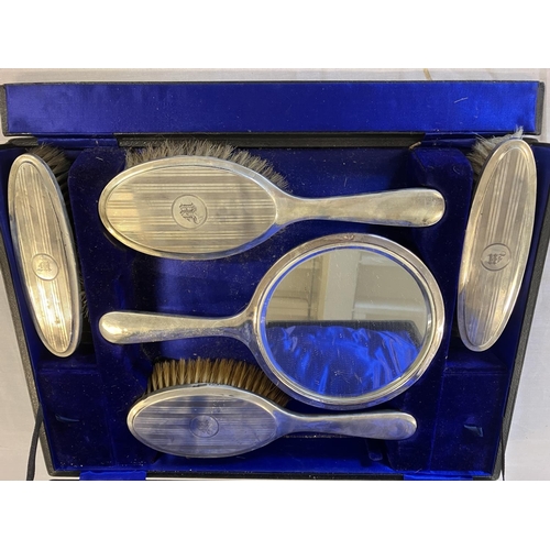 159 - English silver brush and mirror set, cased. Birmingham 1916.