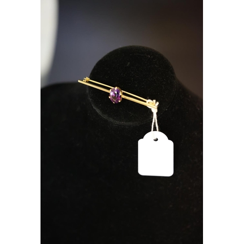 165 - 9ct gold amethyst brooch.