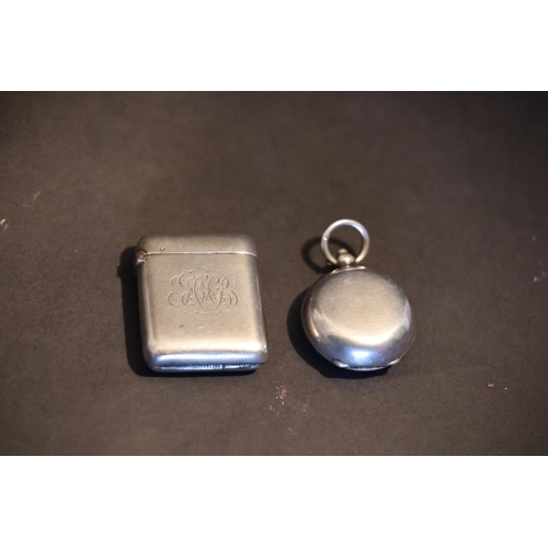 172 - English silver matchbox holder and a coin holder. (2)