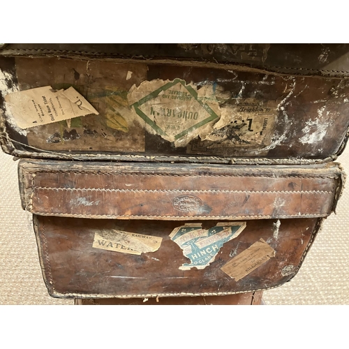 18 - A quantity of old suitcases. (6)