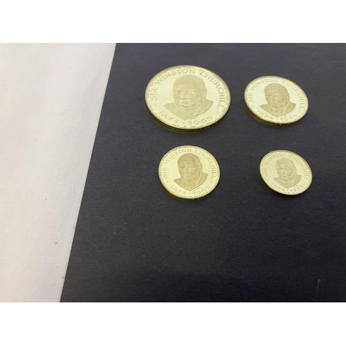 185 - A set of 4 18ct gold Winston Churchill Commemorative Medals each with cert. Weights - 0.128 troy oz,... 