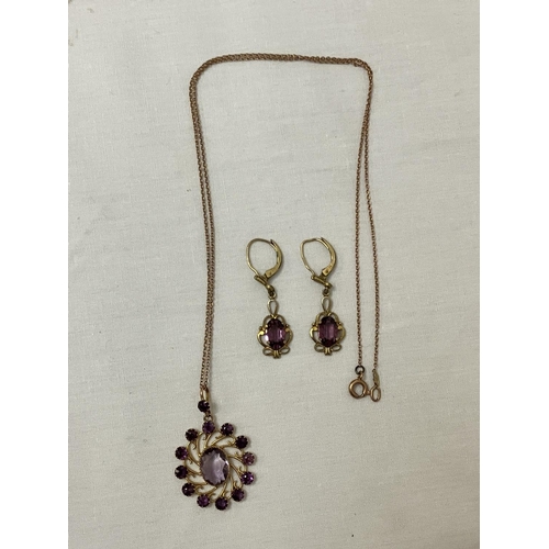 186 - 9ct gold amethyst pendant and matching earrings.