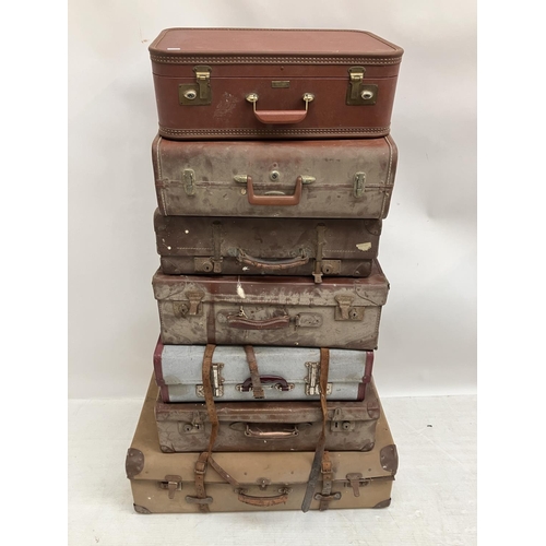 19 - A quantity of old suitcases. (7)