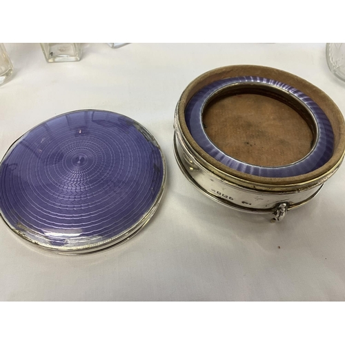 194 - A lot of silver topped and enamel & tortoiseshell toilet jars - powder compact (hinge broken), 2 sil... 