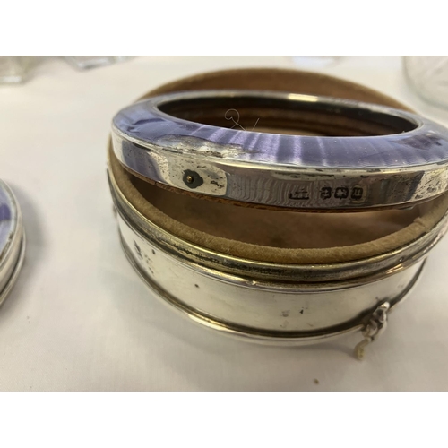 194 - A lot of silver topped and enamel & tortoiseshell toilet jars - powder compact (hinge broken), 2 sil... 