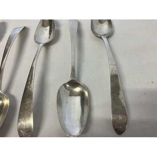 200 - A set of 8 Irish silver bright cut dessert spoons by Isaac D'Olier, Dublin circa 1770.