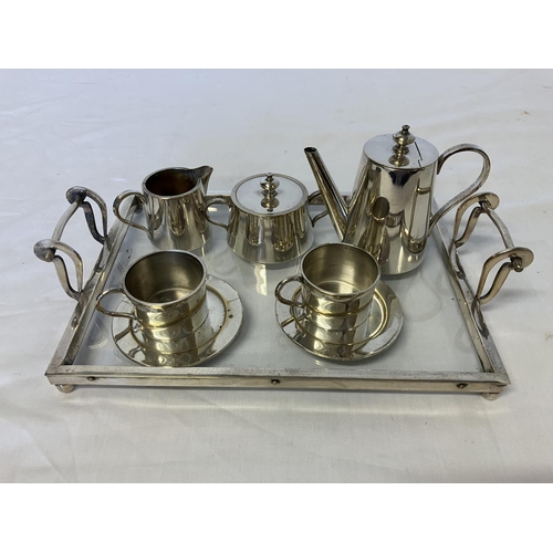 202 - Neat sized silver plated coffee set with plated and glass tray.