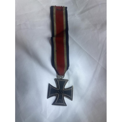 205 - German Iron Cross breast badge, silver with iron core and makers details to suspension ring.