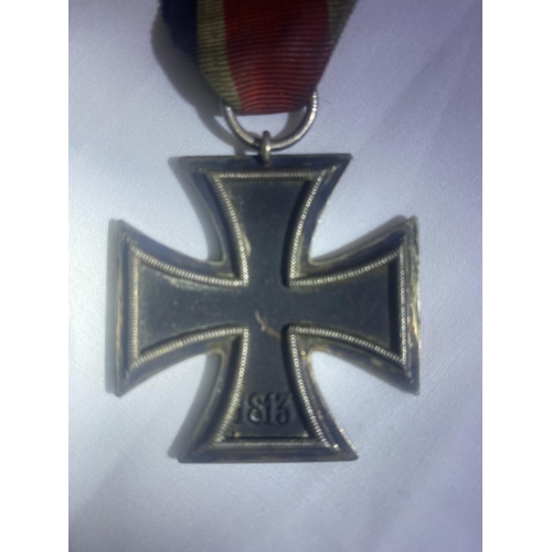 205 - German Iron Cross breast badge, silver with iron core and makers details to suspension ring.