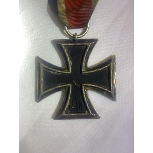 205 - German Iron Cross breast badge, silver with iron core and makers details to suspension ring.