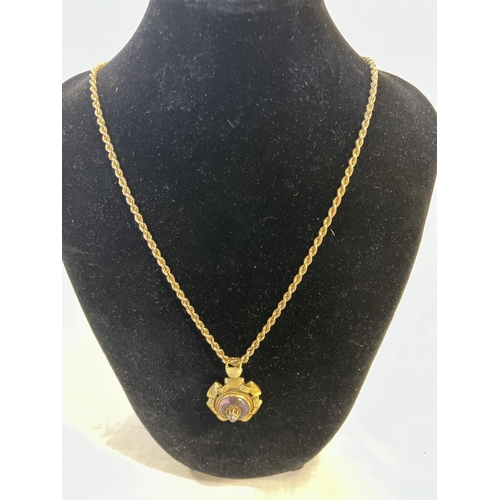 217 - 14ct gold pendant and chain.