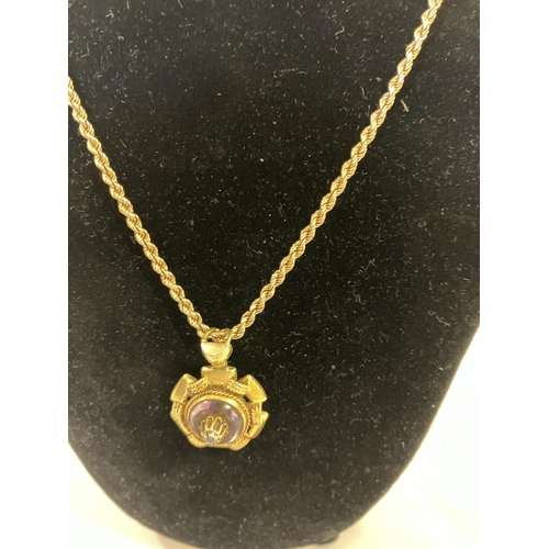 217 - 14ct gold pendant and chain.