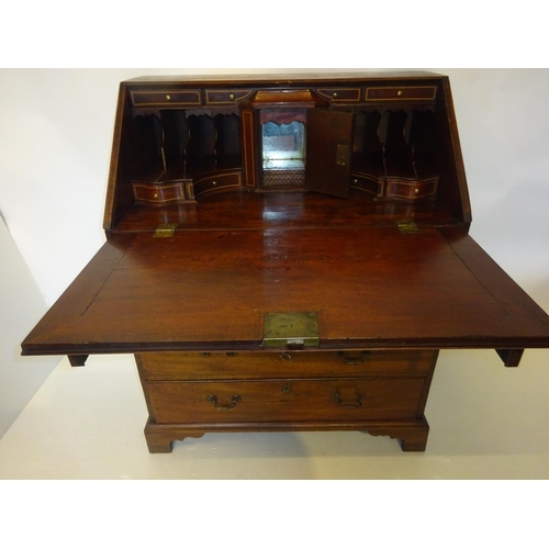 227 - Neat sized Georgian mahogany bureau with well fitted interior. W. 84cm, D. 50cm, H. 105cm approx.