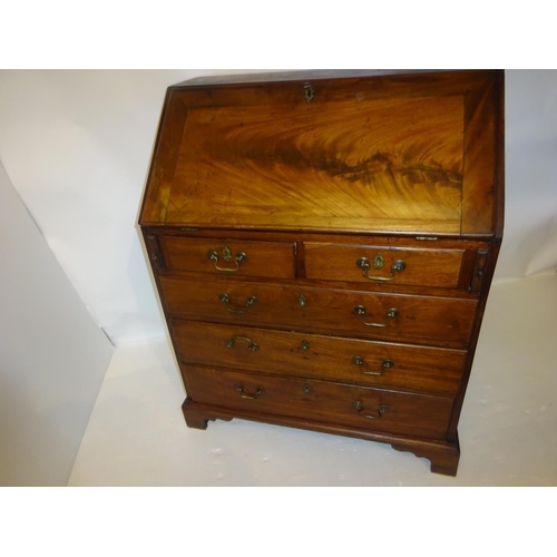 227 - Neat sized Georgian mahogany bureau with well fitted interior. W. 84cm, D. 50cm, H. 105cm approx.