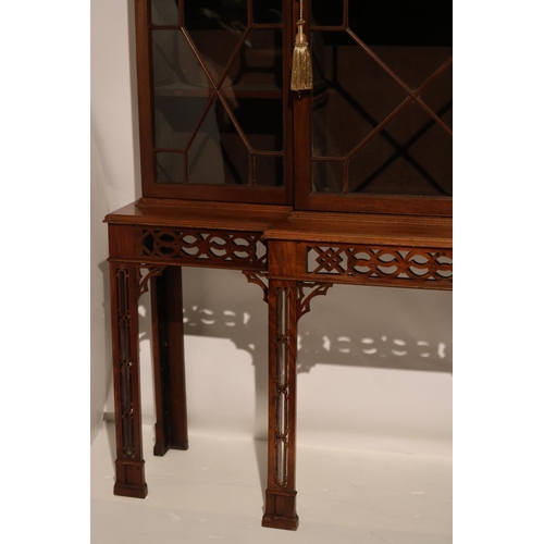 246 - Fine antique mahogany cabinet, the breakfront top having blind fret cornice over 3 section glass doo... 