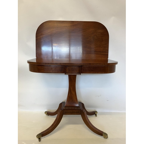 247 - A fine quality Regency style mahogany tea/card table, the D shaped folding top raised on tapered col... 