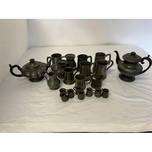 249 - A large collection of antique pewter teapots, tankards, measures, etc. (21)