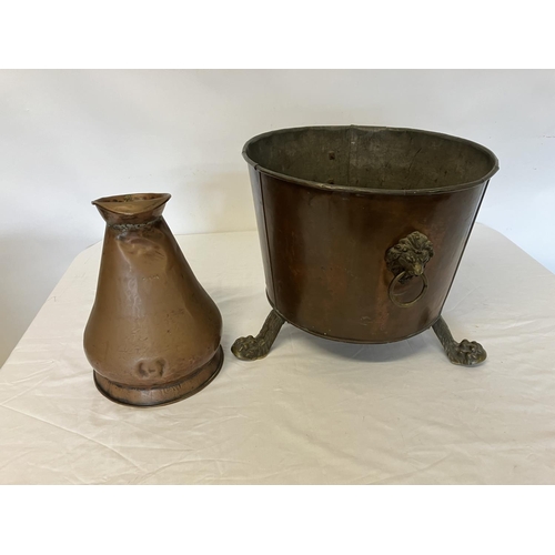 251 - Antique copper coal container having lion mask handles and brass feet together with an old 2 gallon ... 