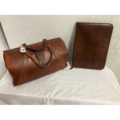 26 - Good quality old leather case and a large travelling wallet. (2)