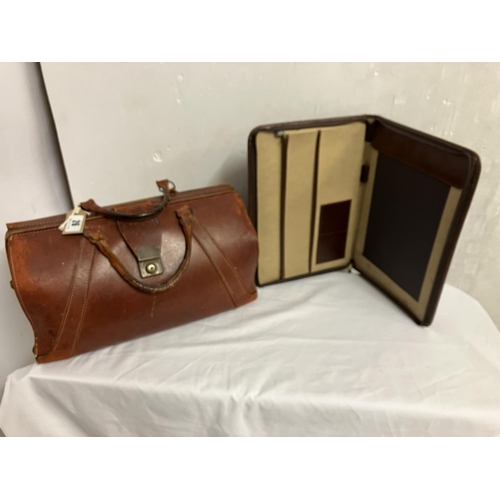 26 - Good quality old leather case and a large travelling wallet. (2)