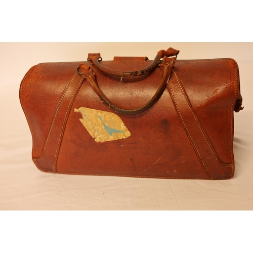 26 - Good quality old leather case and a large travelling wallet. (2)