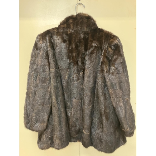 266 - Half length fur coat.