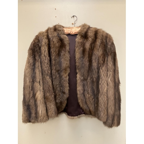 268 - Half length fur coat.