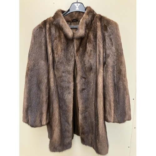 269 - Half length/three quarter fur coat.