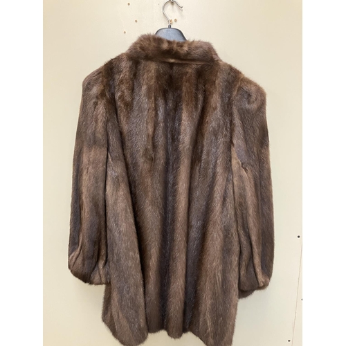 269 - Half length/three quarter fur coat.