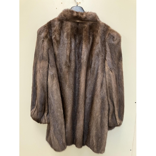 269 - Half length/three quarter fur coat.