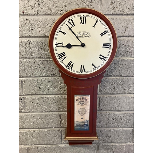 29 - Modern painted wall clock. L. 80cm.