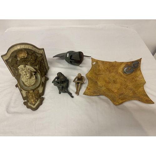 301 - Mixed lot of items - metal Roman helmet, figure or clock bracket, square shaped dish and two pottery... 