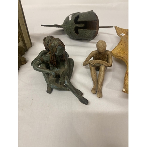 301 - Mixed lot of items - metal Roman helmet, figure or clock bracket, square shaped dish and two pottery... 