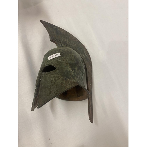 301 - Mixed lot of items - metal Roman helmet, figure or clock bracket, square shaped dish and two pottery... 