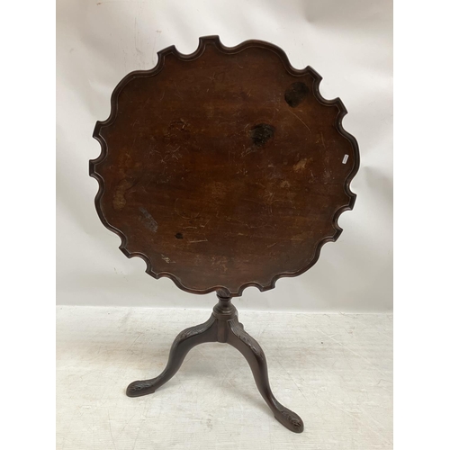 309 - Antique mahogany tea/wine table, the circular top having pie crust border, centre column support and... 